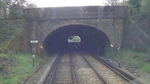 View of Bookham Tunnel in Surrey, where three track workers avoided a train by sheltering in it.