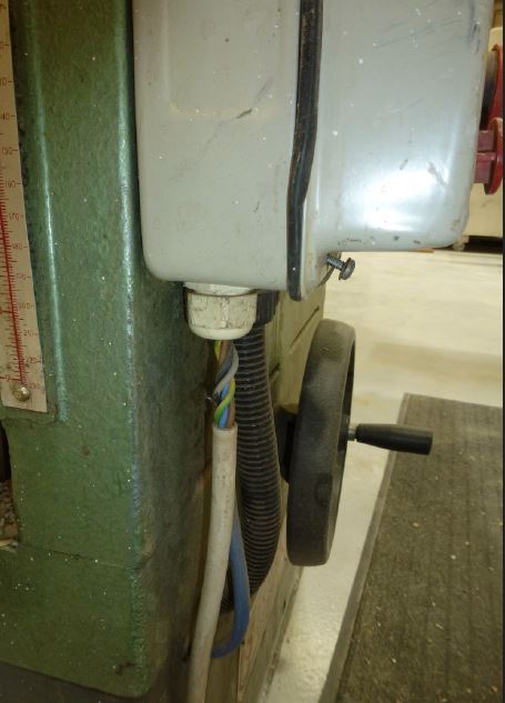A box with exposed wiring - a joinery has been fined after a surprise visit identified various failings.