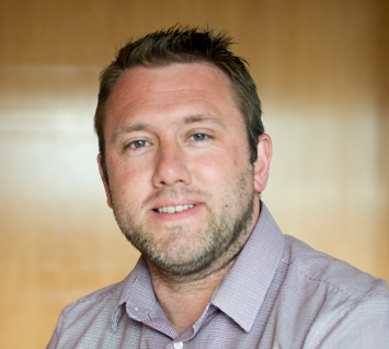 Mugshot of a man looking at the camera - Stuart Byles, Pexhurst director