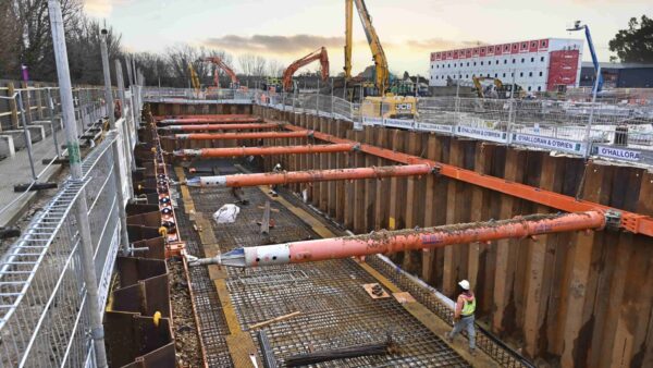 A construction site showing a ground shoring system