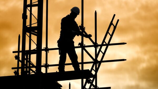 Silhouette construction worker on scaffolding building site - the CLC has launched a consultation on mental health in the industry
