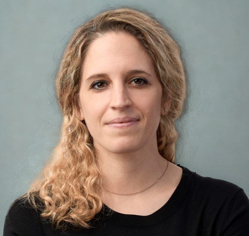 Mugshot of a woman smiling at the camera - Mina Hasman, chair of the Construction Industry Council's Climate Change Committee.