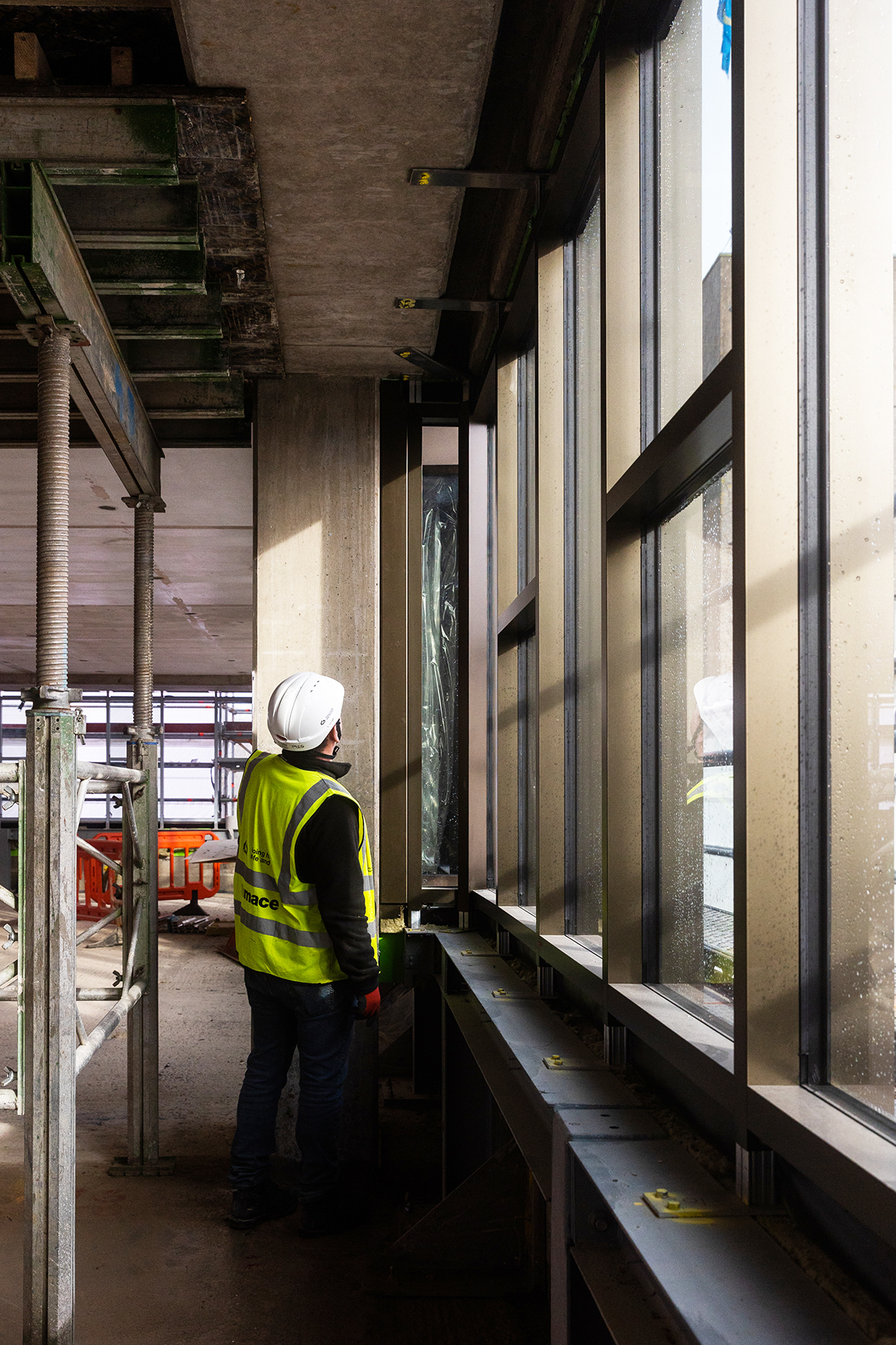 The new Raeynar aluminium windows and secondary steelwork to distribute loads back into the concrete frame. Image: Julie Kim