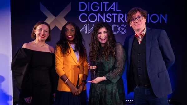 Emine Rachel Taylor-Unlu collects her trophy from Ed Byrne (far right), Ola Obadara from the CIOB (second left) and Karolina Orecchini of Digital Construction Week (far left). Image: © 2026 – ASV Photography Ltd. www.ASVphotos.com