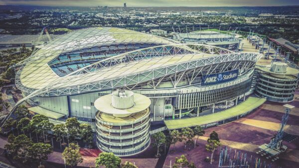 Dr Alan Patching was project director and owning-entity chief executive for the design and construction of the Sydney Olympic Stadium for the 2000 Olympic Games. It’s shown here in 2017, when it was the ANZ Stadium. It’s now branded as Accor Stadium. Image: Andrew Xu/Creative Commons/CC BY-SA 2.0