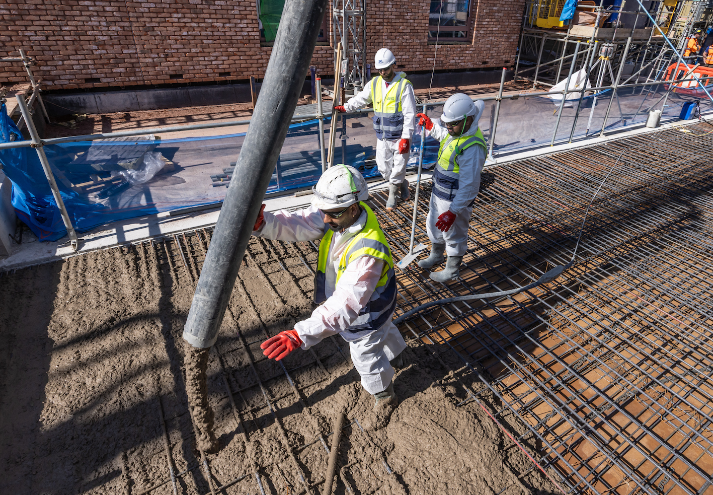 calcined clay concrete - In a UK first, calcined clay concrete has been used in an apartment building going up in North London.