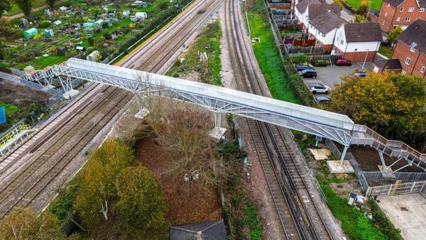 Not a new idea: Network Rail’s 53m-long Tan House Footbridge near Wokingham used repurposed steel tubes for all column elements, their cross-bracings, and the fan members supporting the deck. Image: By Luis Moya, courtesy of Format Engineers.