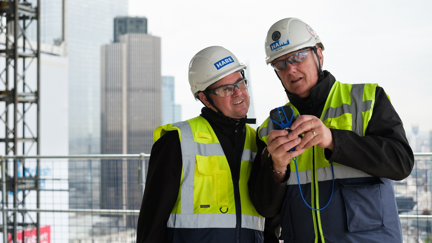 William Hare staff using a smart device on site. Image: William Hare/Safety Culture