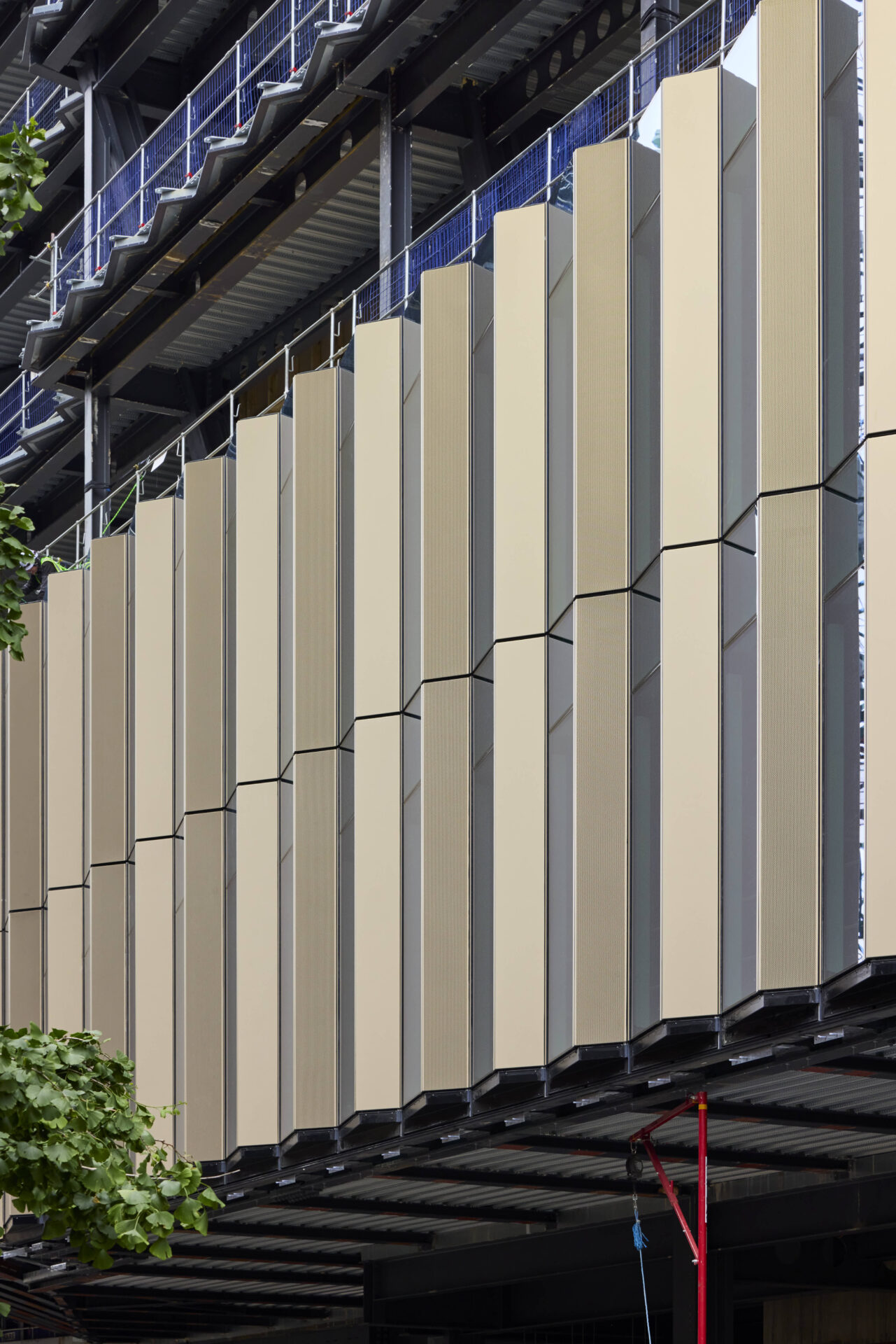 The aluminium façade has a distinctive, sawtooth profile. Image: SRM