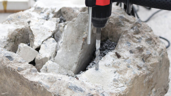 Respirable crystalline silica is generated when brick, concrete, mortar, stone, tiles and plasterboard are cut, drilled or demolished. Image: (null) (null) | Dreamstime.com.